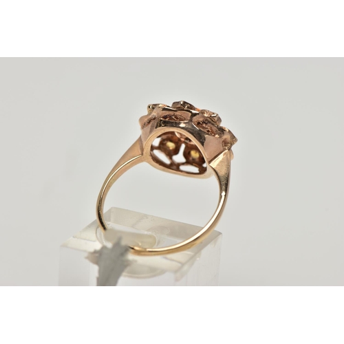23 - A 9CT GOLD CITRINE CLUSTER RING, flower cluster set with circular cut citrines, approximate cluster ... 