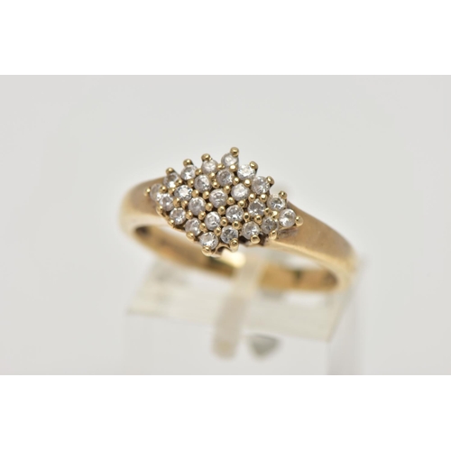 25 - A 9CT GOLD CLUSTER RING, the cluster of a marquise design set with colourless circular cut, cubic zi... 