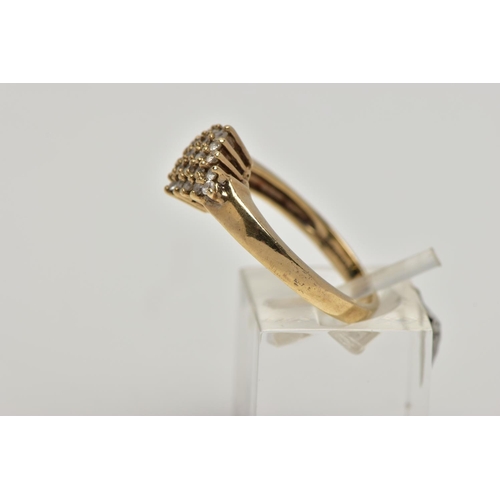 25 - A 9CT GOLD CLUSTER RING, the cluster of a marquise design set with colourless circular cut, cubic zi... 
