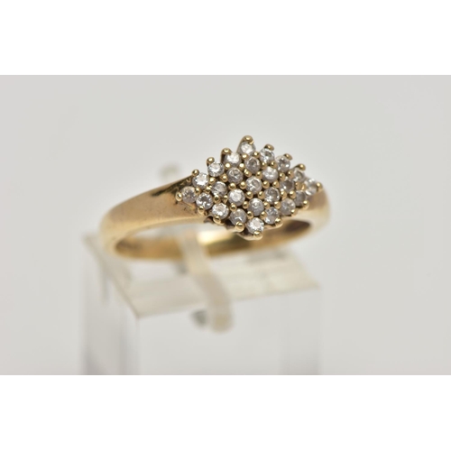 25 - A 9CT GOLD CLUSTER RING, the cluster of a marquise design set with colourless circular cut, cubic zi... 
