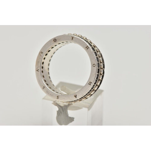 27 - A WIDE WHITE METAL BAND, approximate band width 8.8mm, with a beaded centre between two rows of circ... 