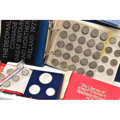 64 - TWO BOXES OF UK AND WORLD COINS SOME LOOSE AND SOME IN THREE ALBUMS, to include a George III crown 1... 