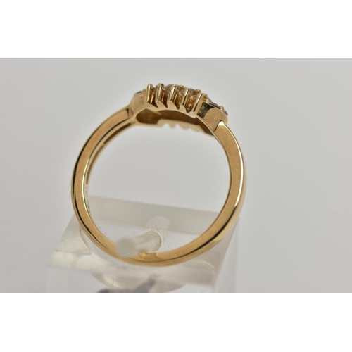 77 - A 9CT GOLD DIAMOND RING, cluster design of an oval form, set with round brilliant cut and rectangula... 