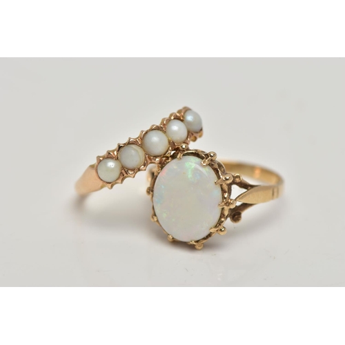 78 - TWO GEM SET RINGS, the first designed with a row of five graduated split pearls, wavy edge detail le... 