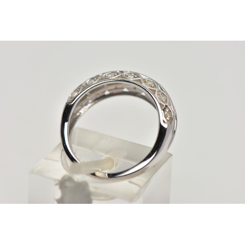 88 - A 9CT WHITE GOLD DIAMOND HALF ETERNITY RING, designed with a central row of rectangular cut diamonds... 
