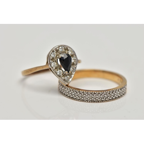 91 - TWO GEM SET RINGS, the first a pear shape cluster set centrally with a four claw pear cut deep blue ... 