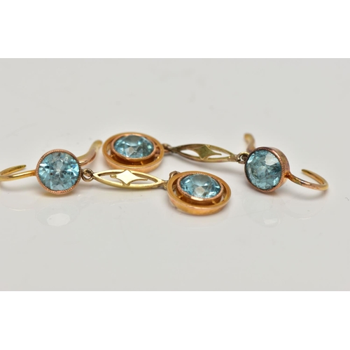 95 - A PAIR OF YELLOW METAL, ZIRCON DROP EARRINGS, each earring is set with two circular cut blue zircons... 