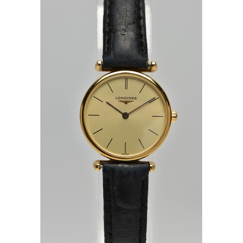 10 - A LADIES 'LONGINES' WRISTWATCH, quartz movement, round champagne dial, signed 'Longines Swiss made',... 