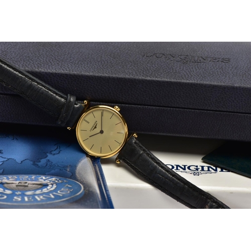 10 - A LADIES 'LONGINES' WRISTWATCH, quartz movement, round champagne dial, signed 'Longines Swiss made',... 