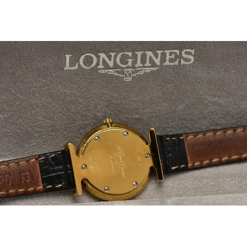 10 - A LADIES 'LONGINES' WRISTWATCH, quartz movement, round champagne dial, signed 'Longines Swiss made',... 