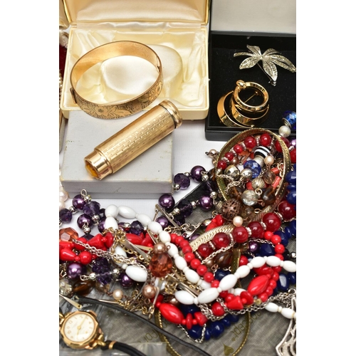 104 - A BOX OF ASSORTED COSTUME JEWELLERY, to include a rolled gold hinged bangle with a floral and bark e... 