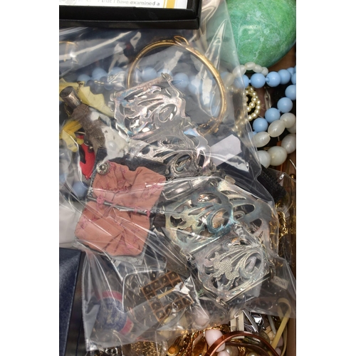 108 - A BOX OF ASSORTED ITEMS, to include a yellow metal slim buckle bangle, detailed with foliage scrolli... 