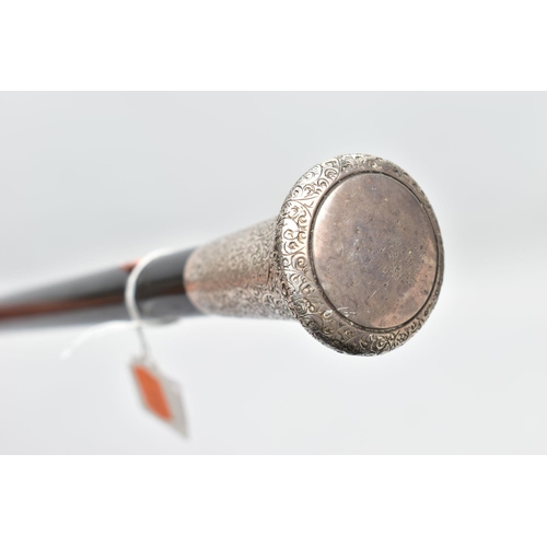 113 - AN EARLY 20TH CENTURY SILVER MOUNTED WALKING STICK, a silver pommel intricately detailed with a scro... 