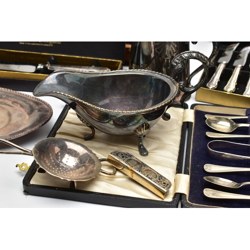 128 - AN ASSORTMENT OF WHITE METAL SERVICE ITEMS AND SUNDRIES, to include a selection of 'Arthur Price' it... 