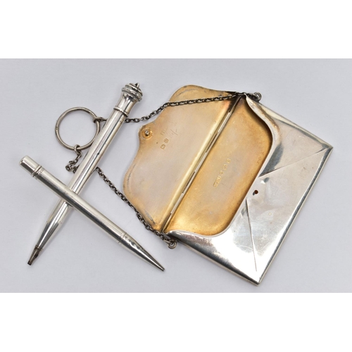 17 - A SILVER CARD CASE AND TWO PROPELLING PENCILS, the card case in the form of an envelope fitted with ... 