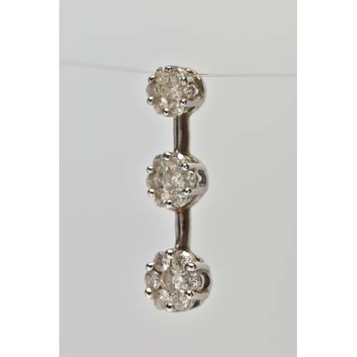 2 - A 9CT WHITE GOLD DIAMOND CLUSTER PENDANT, comprising of three graduated brilliant cut diamond floral... 