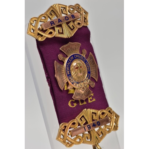 20 - A 9CT GOLD R.A.O.B WITH PURPLE RIBBON, the central panel AF, embossed Buffalo with red enamel eyes, ... 