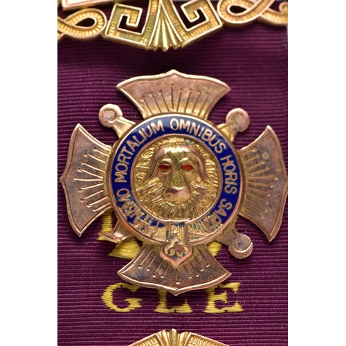 20 - A 9CT GOLD R.A.O.B WITH PURPLE RIBBON, the central panel AF, embossed Buffalo with red enamel eyes, ... 