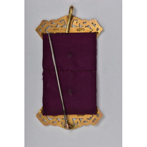 20 - A 9CT GOLD R.A.O.B WITH PURPLE RIBBON, the central panel AF, embossed Buffalo with red enamel eyes, ... 