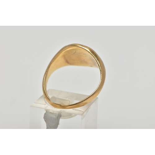 22 - A 9CT GOLD SIGNET RING, oval signet with worn engraving, textured shoulders leading onto a tapering ... 