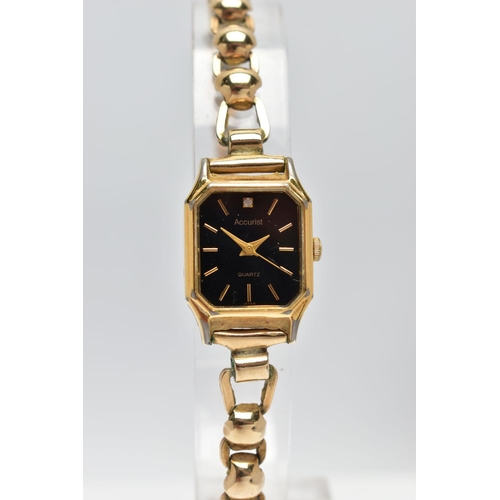 33 - A LADIES 1950's 'ACCURIST' WRISTWATCH WITH 9CT GOLD STRAP, the octagonal black dial, signed 'Accuris... 