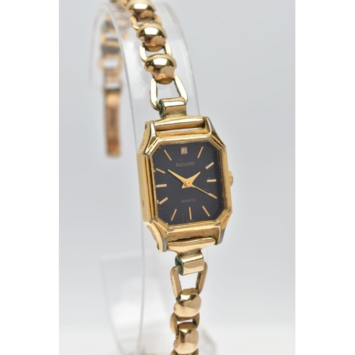 33 - A LADIES 1950's 'ACCURIST' WRISTWATCH WITH 9CT GOLD STRAP, the octagonal black dial, signed 'Accuris... 