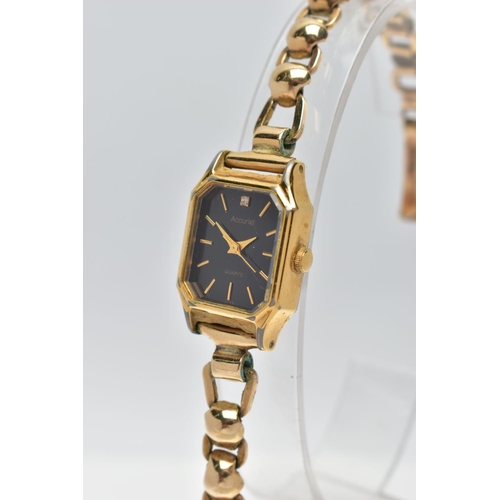 33 - A LADIES 1950's 'ACCURIST' WRISTWATCH WITH 9CT GOLD STRAP, the octagonal black dial, signed 'Accuris... 