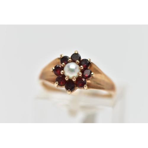 42 - A 9CT GOLD CULTURED PEARL AND GARNET CLUSTER RING, the claw set cultured pearl, with circular cut ga... 