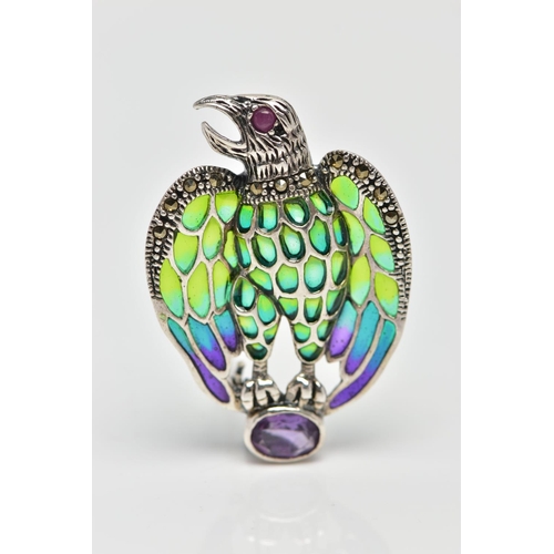 43 - A PLIQUE A JOUR, RUBY AND AMETHYST BIRD BROOCH/PENDANT, the bird of prey with ruby set eye detail, t... 