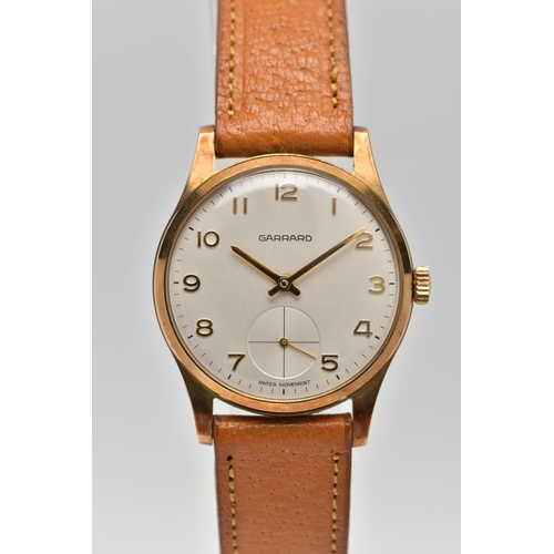 48 - A 9CT GOLD 'GARRARD' WRISTWATCH, hand wound movement, round white dial signed 'Garrard' 'Swiss movem... 