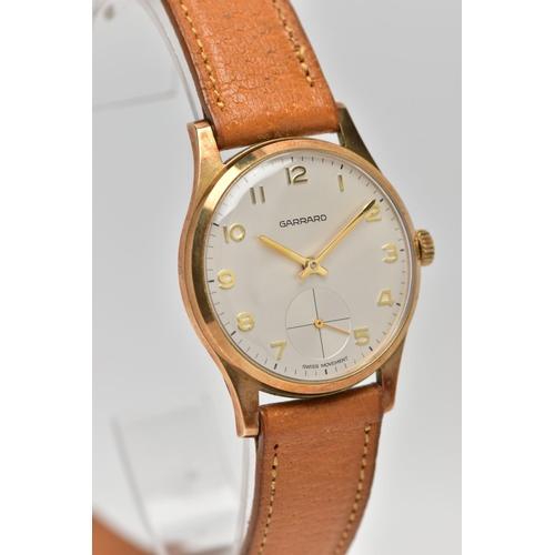 48 - A 9CT GOLD 'GARRARD' WRISTWATCH, hand wound movement, round white dial signed 'Garrard' 'Swiss movem... 