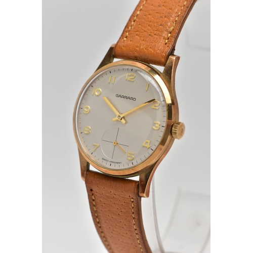 48 - A 9CT GOLD 'GARRARD' WRISTWATCH, hand wound movement, round white dial signed 'Garrard' 'Swiss movem... 