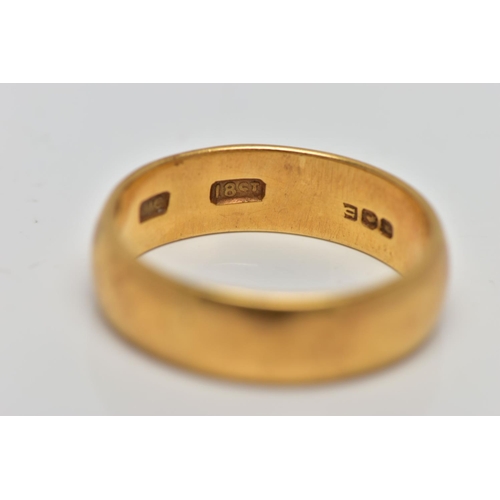 58 - A YELLOW METAL WIDE BAND RING, plain polished wide band, approximate width 6.2mm, stamped '18ct', wi... 