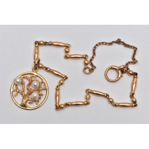 62 - A YELLOW METAL CHARM AND BRACELET, the charm of an oval openwork form depicting a textured tree fixe... 