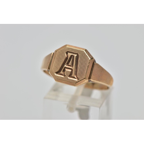 70 - A 9CT GOLD SIGNET RING, square signet with cut off corners, engine turned design with engraved initi... 