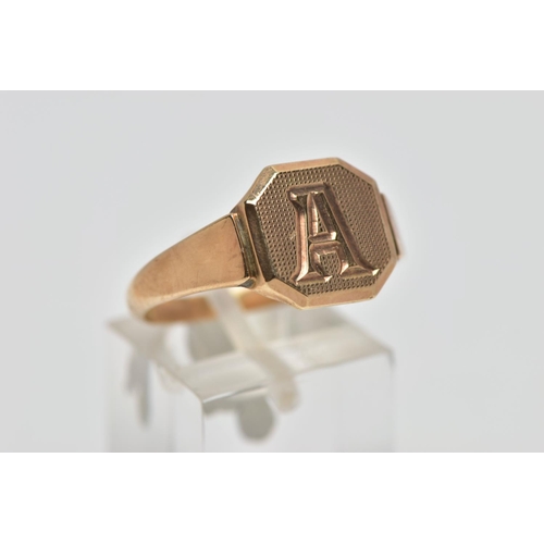 70 - A 9CT GOLD SIGNET RING, square signet with cut off corners, engine turned design with engraved initi... 