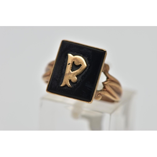 71 - A VICTORIAN INITIAL MOURNING RING, designed with a black rectangular onyx insert, displaying a yello... 