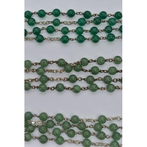 78 - FOUR HANDMADE ROSARY BEAD NECKLACES, each comprising a single uniform row of spherical beads, two ne... 