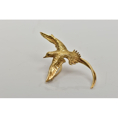 8 - A YELLOW METAL BIRD BROOCH PENDANT, a small brooch depicting a long tailed bird, approximate wing sp... 