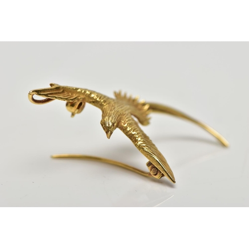 8 - A YELLOW METAL BIRD BROOCH PENDANT, a small brooch depicting a long tailed bird, approximate wing sp... 