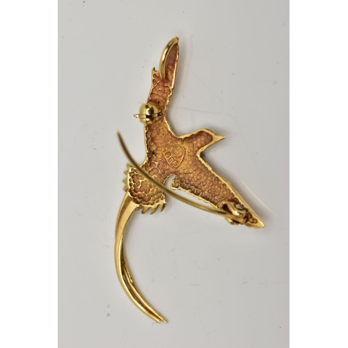 8 - A YELLOW METAL BIRD BROOCH PENDANT, a small brooch depicting a long tailed bird, approximate wing sp... 