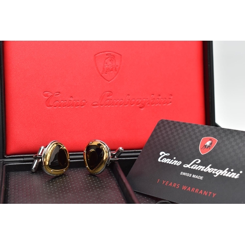 82 - A PAIR OF 'TONINO LAMBORGHINI' CUFFLINKS, rounded triangle cufflinks detailing a polished white and ... 