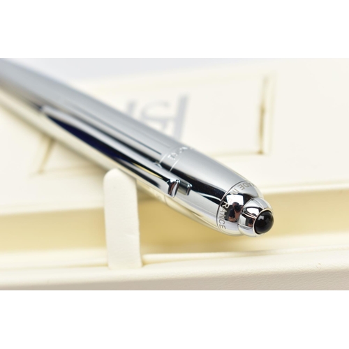 83 - A SAINT HONORE BALLPOINT PEN, a white metal twist weighted pen, detailed with a linear grooved patte... 