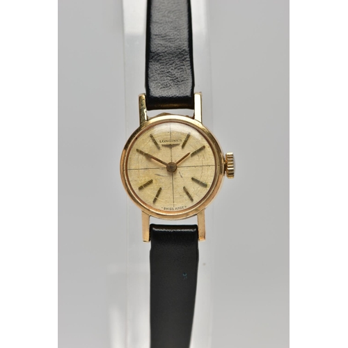 9 - A LADIES 9CT GOLD 'LONGINES' WRISTWATCH, hand wound movement, round champagne dial, signed 'Longines... 