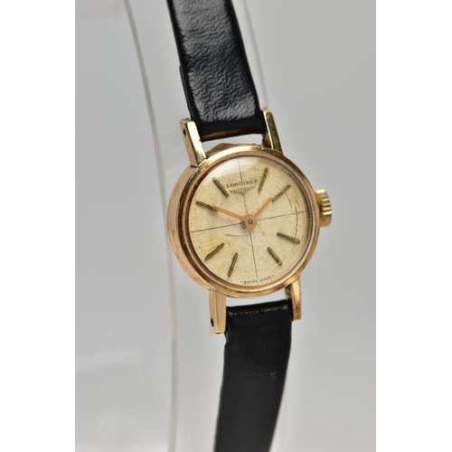 9 - A LADIES 9CT GOLD 'LONGINES' WRISTWATCH, hand wound movement, round champagne dial, signed 'Longines... 