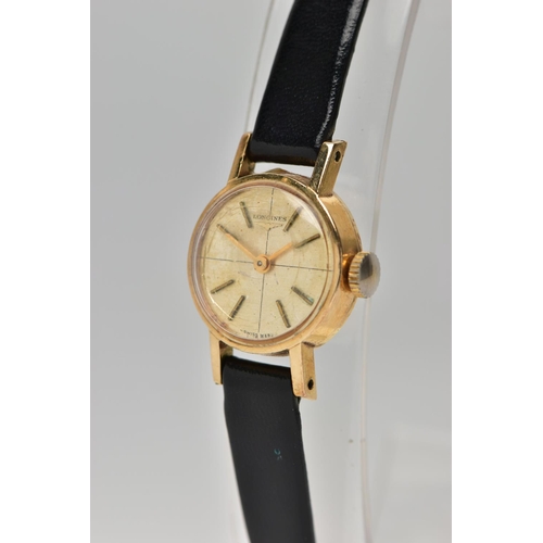 9 - A LADIES 9CT GOLD 'LONGINES' WRISTWATCH, hand wound movement, round champagne dial, signed 'Longines... 