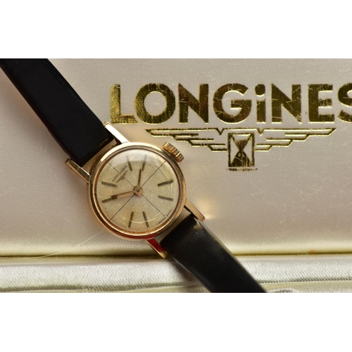 9 - A LADIES 9CT GOLD 'LONGINES' WRISTWATCH, hand wound movement, round champagne dial, signed 'Longines... 