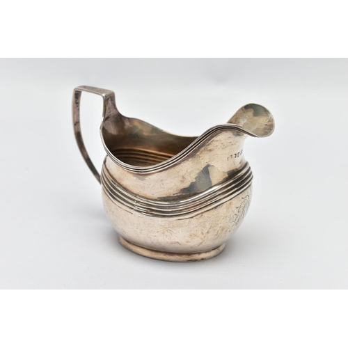 92 - A GEORGE III SILVER MILK JUG, designed with ribbed banding, to the plain base, with monogram detail ... 