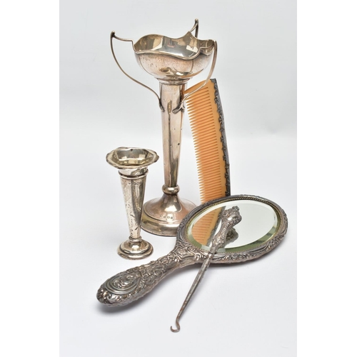 95 - A SELECTION OF EARLY TO MID 20TH CENTURY SILVER, to include a scroll and floral embossed hand mirror... 