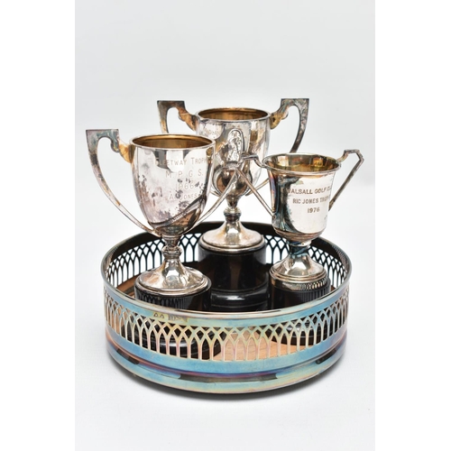 99 - AN ASSORTMENT OF SILVERWARE, to include three small silver trophies, each fitted with black plinths,... 